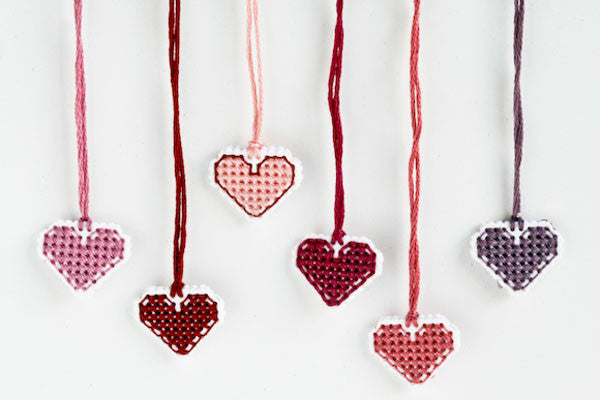 Cross stitch heart charms for Valentine's Day - so quick you can make a whole batch